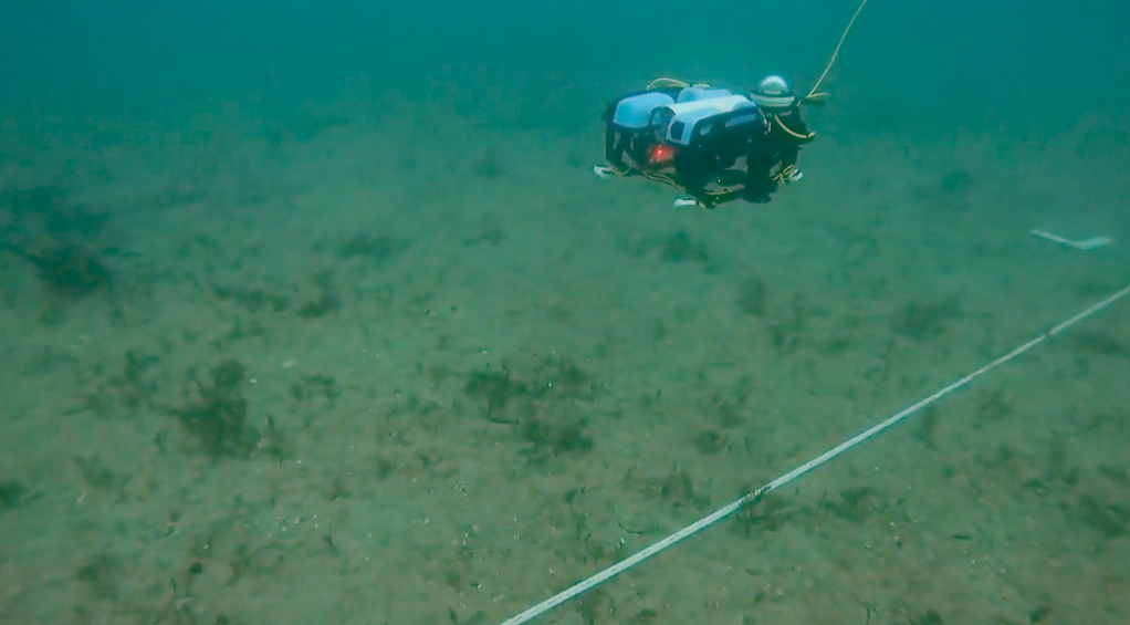 The UWAI vehicle running a marked transect line low over a soft-sediment seabed